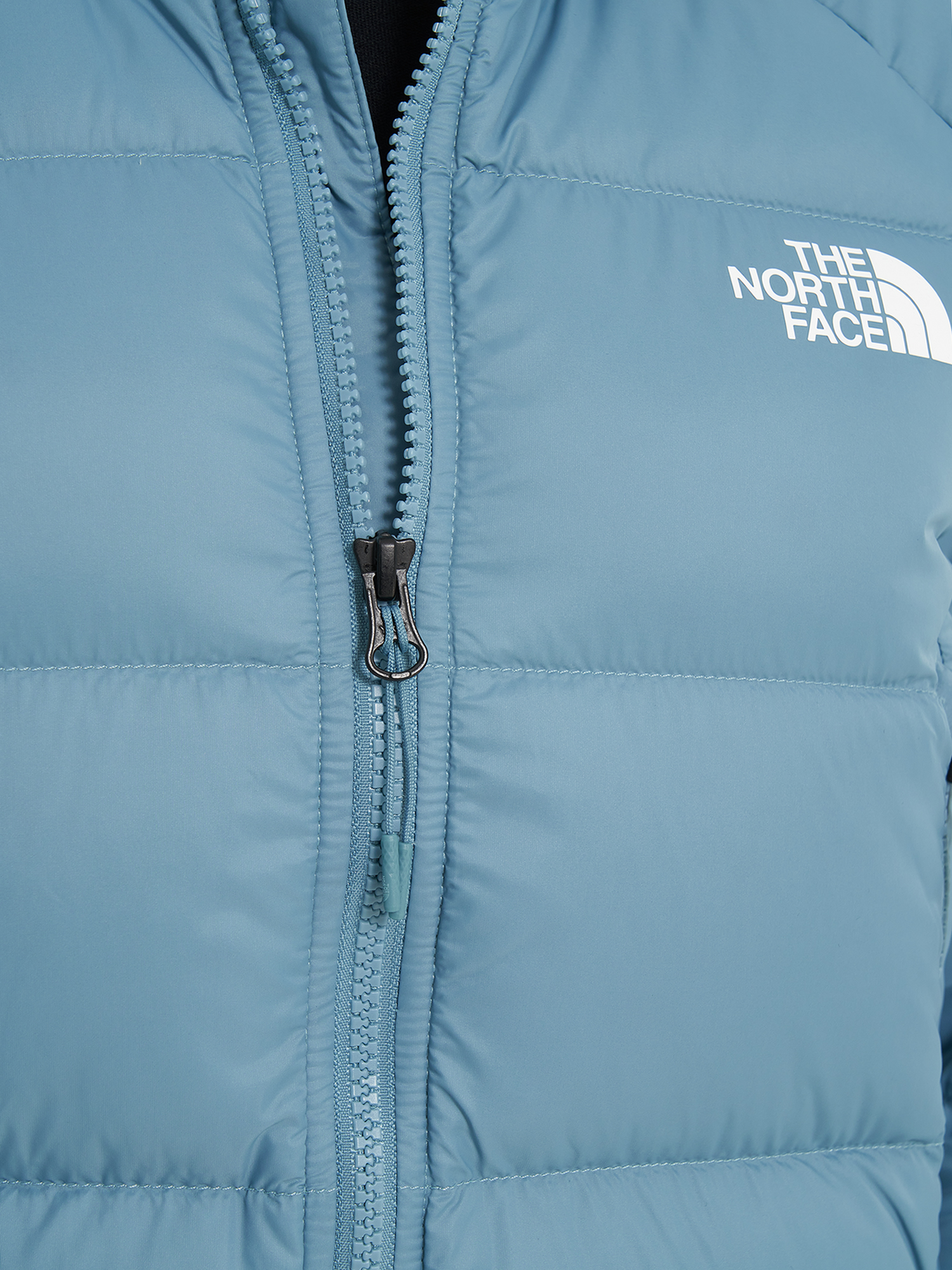 фото Пуховик женский the north face hyalite, голубой