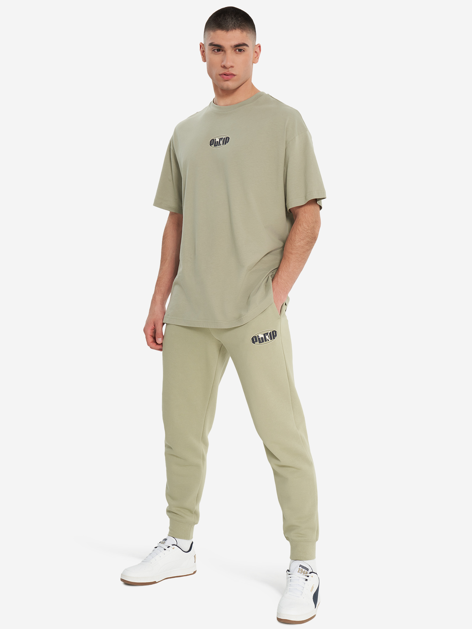 фото Брюки мужские puma ess logo lab execution, зеленый