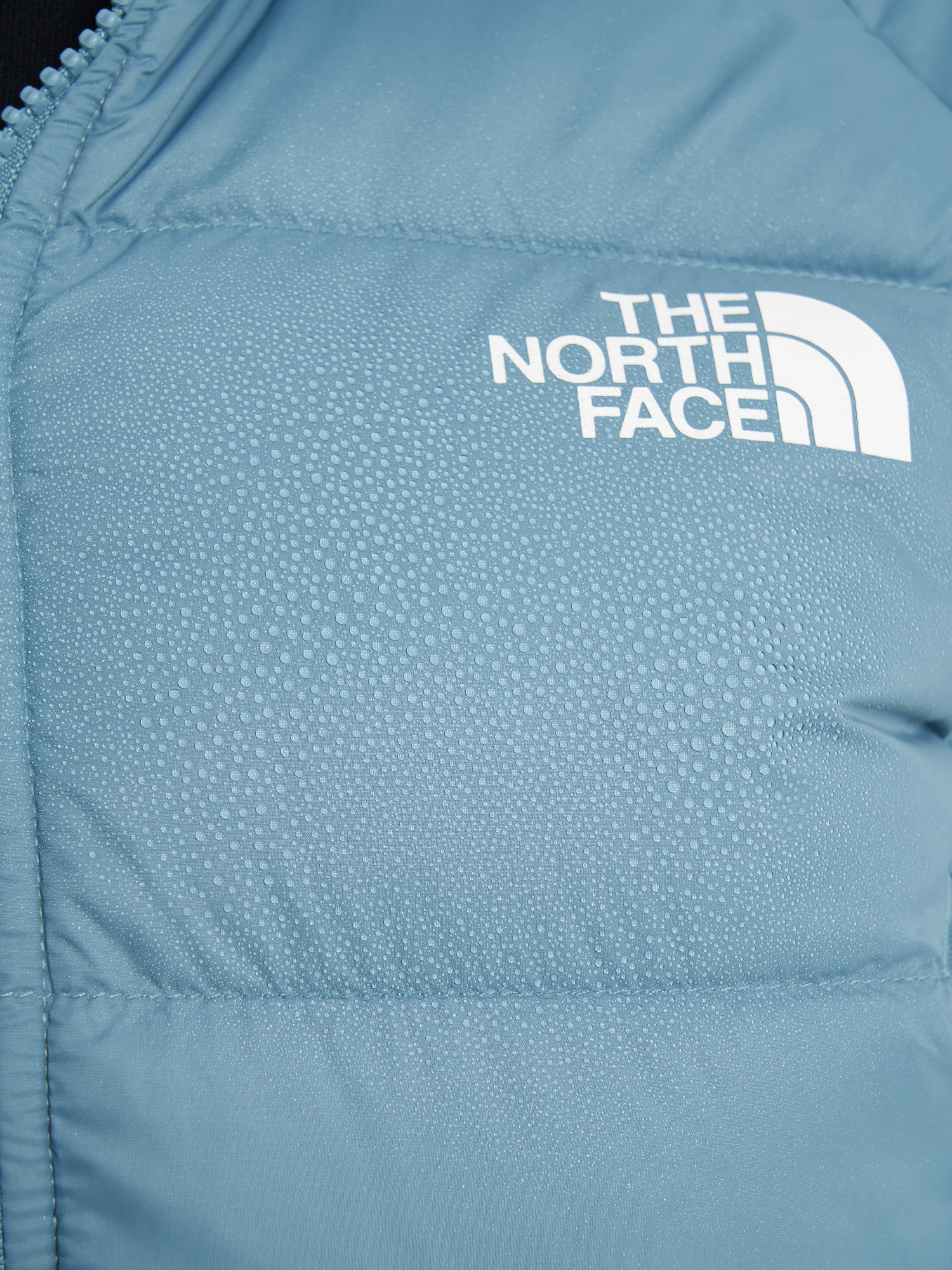 фото Пуховик женский the north face hyalite, голубой