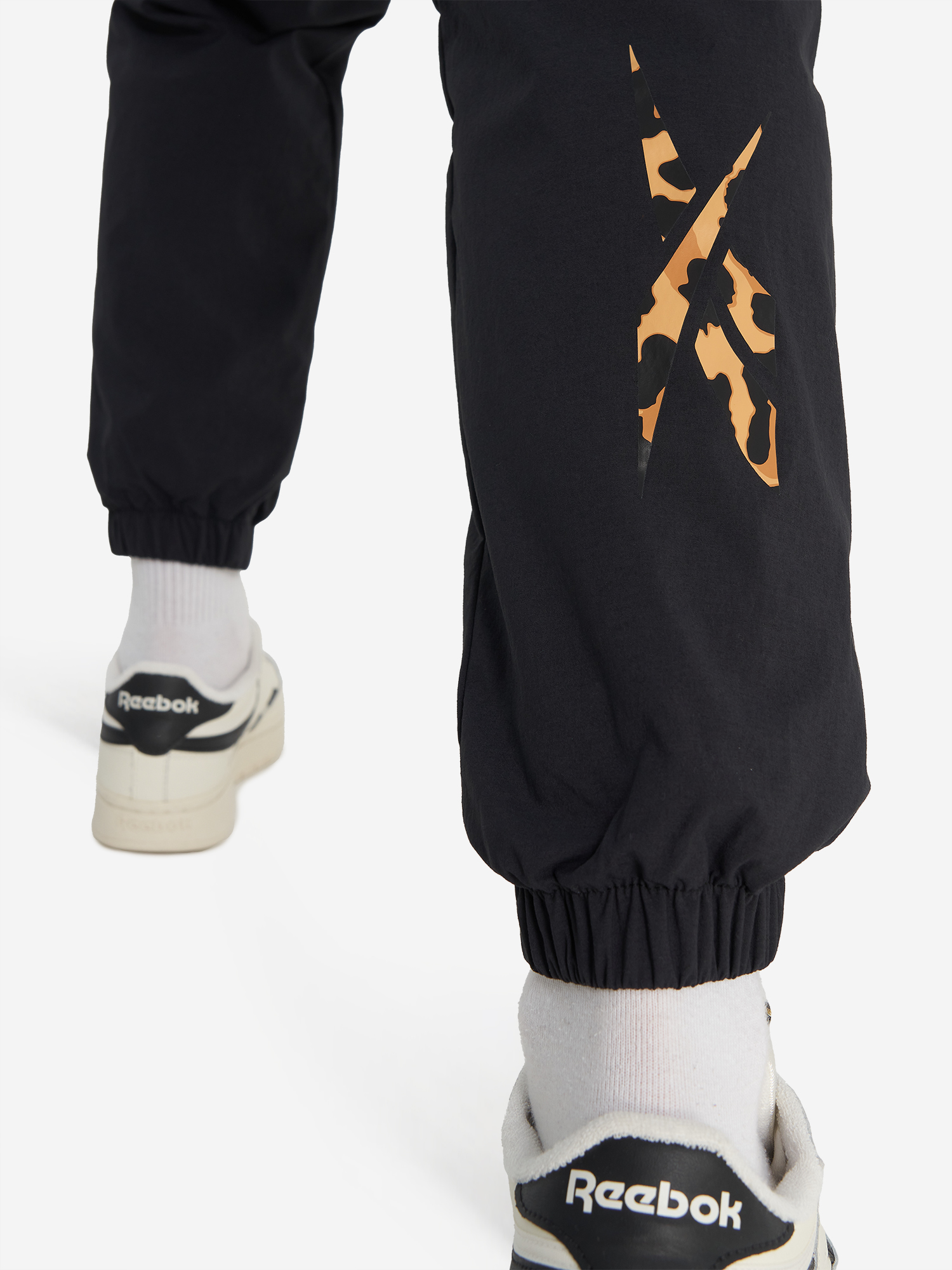 фото Брюки женские reebok vector track, черный