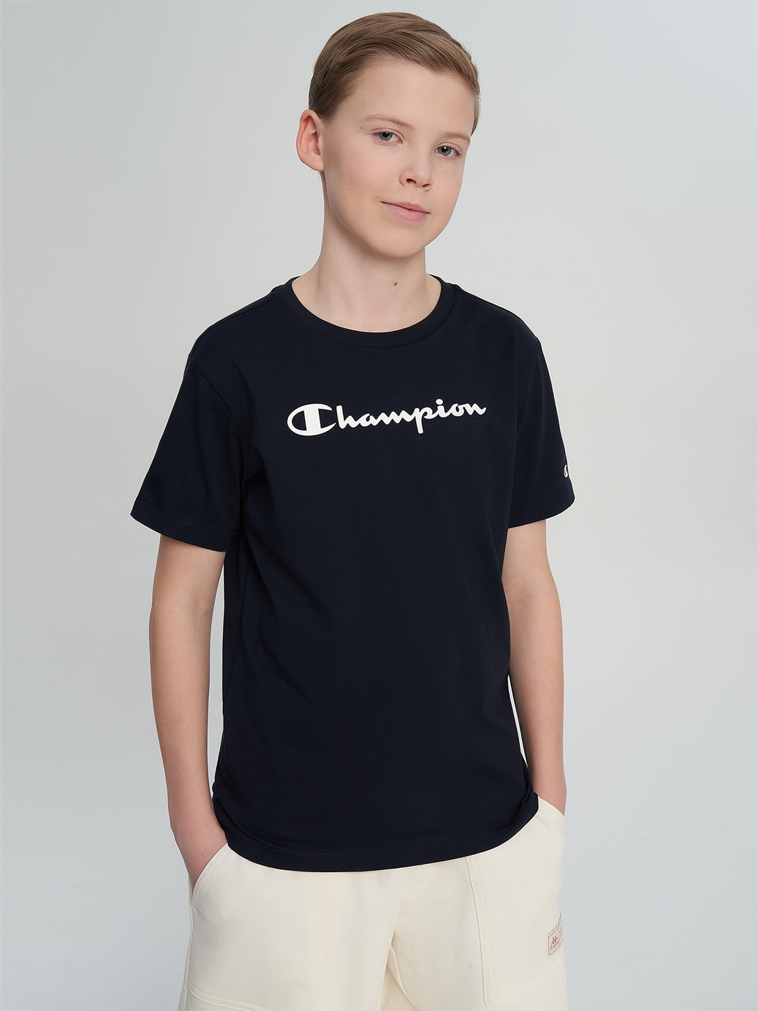 Изображение товара Футболка для мальчиков Champion темно-синяя с надписями спортивный стиль лето