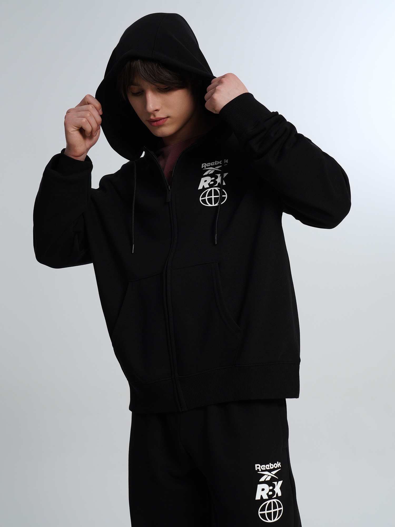Изображение товара Толстовка Reebok мужская с капюшоном - молния, 60% хлопок Изображение товара Толстовка Reebok мужская с капюшоном - молния, 60% хлопок