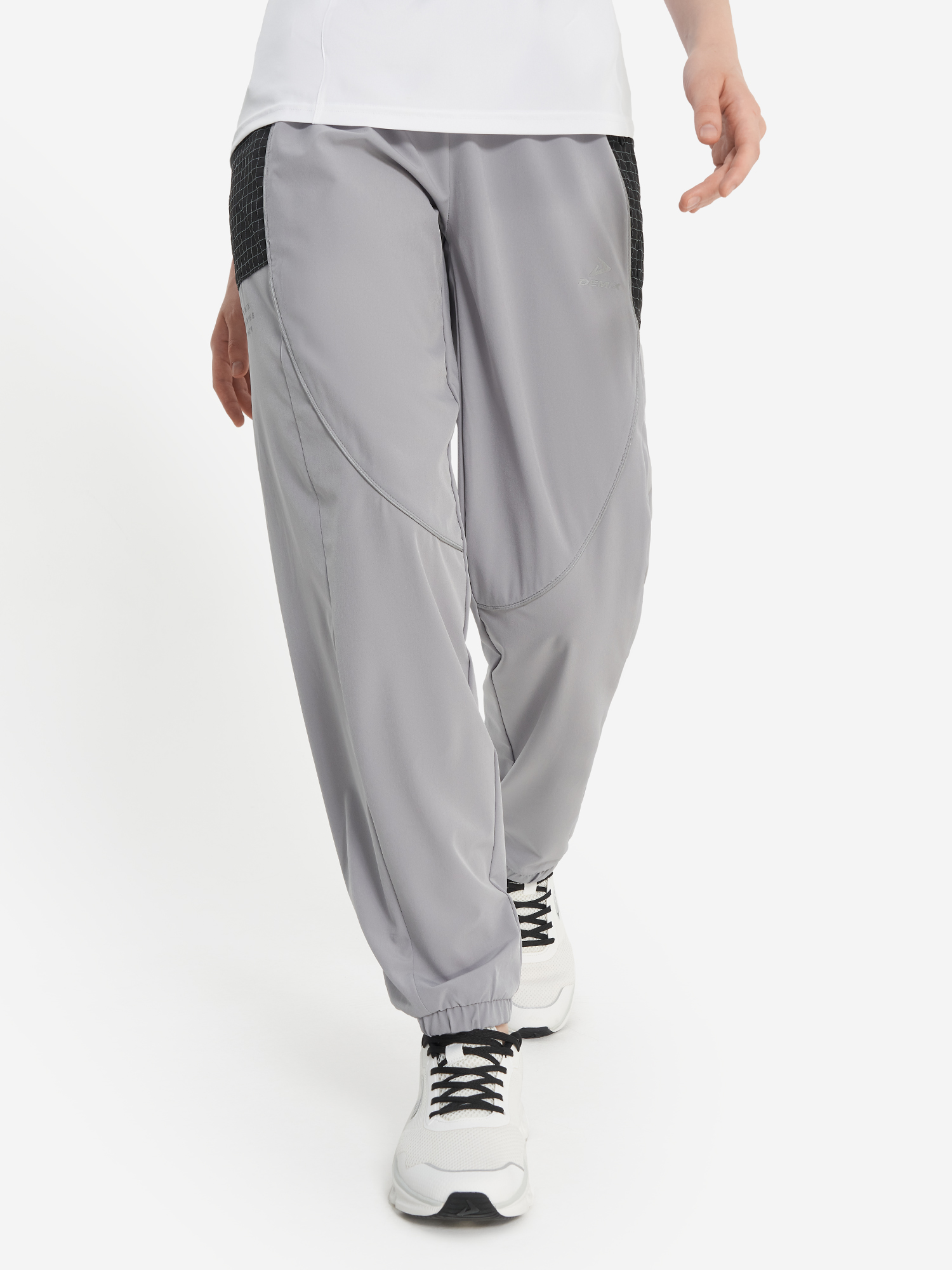 Изображение товара Женские спортивные брюки Demix для бега с светоотражающими элементами Изображение товара Женские спортивные брюки Demix для бега с светоотражающими элементами