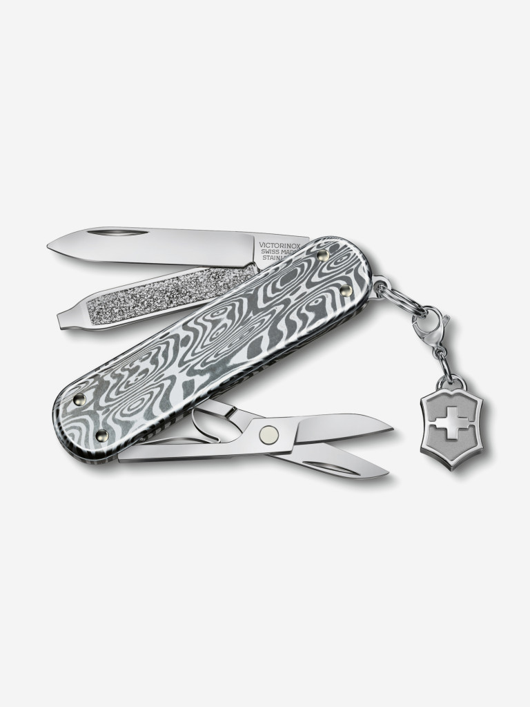 Нож vt. Victorinox Classic Swiss Wrestling. Нож-брелок Victorinox. Victorinox брелок. Victorinox Signature.