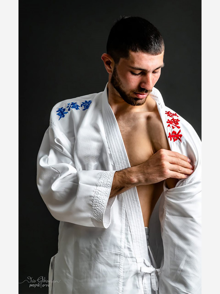 Кимоно TOKAIDO Kumite Master K1 двустороннее (АКА/АО) 3,5 унции
