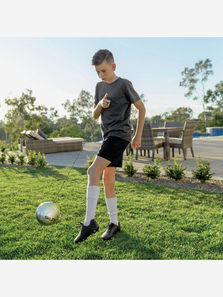 Мяч тренажер на резинке для отработки ударов и пасов SKLZ электрик лайм