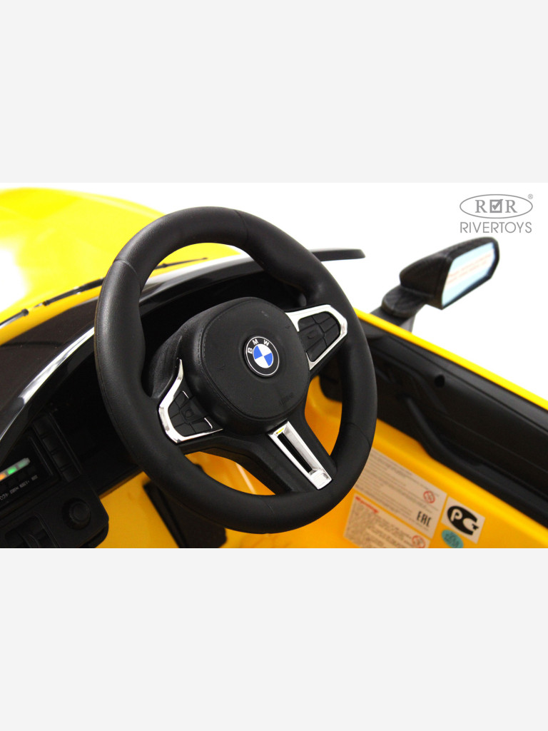 Детский электромобиль RIVERTOYS BMW M4 (A004AA) желтый